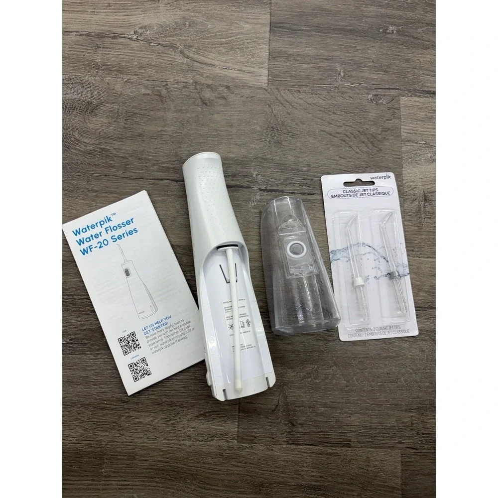 Waterpik Cordless Pulse 3100 Rechargeable Portable Water Flosser With 2 New Tips